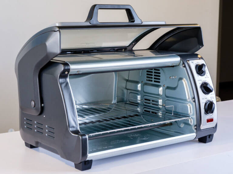 Review image showing the real Hamilton Beach Easy Reach Roll-Top Door mini oven design in our test kitchen